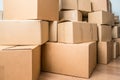 Detail of many cardboard boxes full of household items during a move Royalty Free Stock Photo