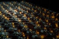 Detail of Many red votive candles light with shallow depth of field inside Chinese temple Royalty Free Stock Photo