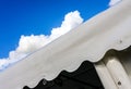 Abstract view of a wedding marque against the summer sky.