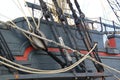 Detail of mast of ship. Detailed rigging with sails. Royalty Free Stock Photo
