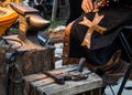 Detail of medieval blacksmith`s clothing and tools in the traditional yearly Medieval Market celebration in Puebla de Sanabria.