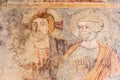 Detail of medieval mosaic in ruins showing two catholic saints