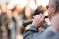 Men playing a typical wind instrument of the celebration of the Fallas of Valencia, called