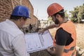 Detail of men working in construction