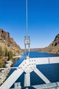 Detail of the metal girders and cable of the bridge over the Deschutes River at Cove Palisades State Park, Oregon, USA Royalty Free Stock Photo