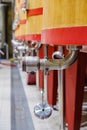 Detail of a metal tap for emptying a large barrel where the grapes begin to ferment to become wine f