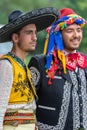 Detail of a Mexican and Turkish folk costumes