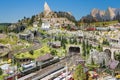 Detail of model railway with landscape, villages and operating train
