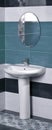 Detail of a modern bathroom with white sink Royalty Free Stock Photo