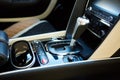 Detail of modern car interior, gear stick. Royalty Free Stock Photo