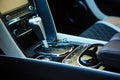 Detail of modern car interior, gear stick. Royalty Free Stock Photo