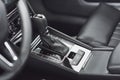 Detail of modern car interior, gear stick, automatic transmission in expensive car. Royalty Free Stock Photo