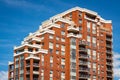 Detail of modern high-rise building. High rises in Kelowna downtown on a sunny summer day. Modern apartment buildings Royalty Free Stock Photo