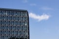 Detail of a modern high rise office building with blue sky