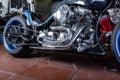 Detail on a modern motorcycle in the workshope. Motorcycle Exhaust. selective focus Royalty Free Stock Photo