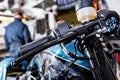 Detail on a modern motorcycle in the workshope. Motorcycle Exhaust. selective focus Royalty Free Stock Photo