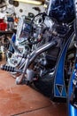 Detail on a modern motorcycle in the workshope. Motorcycle Exhaust. selective focus Royalty Free Stock Photo