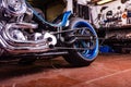 Detail on a modern motorcycle in the workshope. Motorcycle Exhaust. selective focus Royalty Free Stock Photo