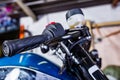 Detail on a modern motorcycle in the workshope. Motorcycle Exhaust. selective focus Royalty Free Stock Photo