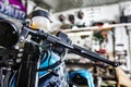 Detail on a modern motorcycle in the workshope. Motorcycle Exhaust. selective focus Royalty Free Stock Photo