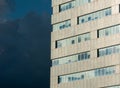 Detail of a modern office building, dark blue sky  backround Royalty Free Stock Photo