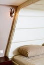 Detail of modern style bedroom with lather headboard Royalty Free Stock Photo