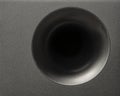Detail modern subwoofer, closeup, audio speaker. Circle membrane sound speaker on black background Royalty Free Stock Photo