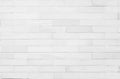 Detail of modern white brick wall background photo. White brick wall texture background for stone tile block painted in grey light Royalty Free Stock Photo