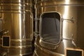 Detail modern wine cellar with stainless steel tanks vats Royalty Free Stock Photo