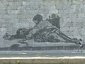 Detail of the monumental mural of William Kentridge along the Tiber of Rome in Italy.