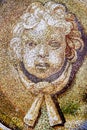 Detail of the mosaic shows the head of a child angel Royalty Free Stock Photo