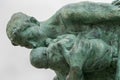 Detail of Mother and children hiding from the storm statue. Royalty Free Stock Photo