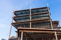 Detail of multilevel modern office building under construction with visible steel frame, Silicon Valley, California