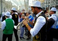 Detail of a musician plays the trumpet