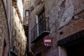 Detail of the narrow streets in the town of albarracin, teruel spain, with the texture of old brick walls and a traffic sign of Royalty Free Stock Photo