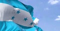 Detail of the national flag of Honduras waving in the wind on a clear day