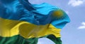 Detail of the national flag of Rwanda waving in the wind on a clear day