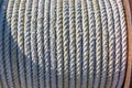 Coiled rope on a winch on a sailboat