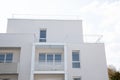 Detail of a new modern white apartment building Royalty Free Stock Photo