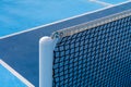 Detail of a new tennis net on a pickleball court Royalty Free Stock Photo