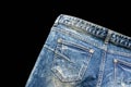 Detail of nice blue jeans on black background Royalty Free Stock Photo