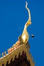 A detail of northern thai temple gable ,Chofah , under clear blue sky Royalty Free Stock Photo