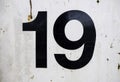 Number nineteen on a wall Royalty Free Stock Photo