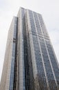 Detail of office building exterior. Business buildings skyline looking up with blue sky. Modern architecture apartment. High tech Royalty Free Stock Photo