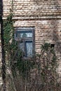 Detail of old window on brick wall Royalty Free Stock Photo