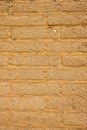 Detail of old adobe brick wall for background or texture. Mud brick background to add your text. Rustic textures concept for greeg Royalty Free Stock Photo