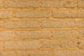 Detail of old adobe brick wall for background or texture. Mud brick background to add your text. Rustic textures concept for greeg Royalty Free Stock Photo