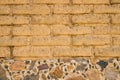 Detail of old adobe brick wall for background or texture. Mud brick background to add your text. Rustic textures concept for greeg Royalty Free Stock Photo