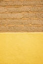 Detail of old adobe brick wall for background or texture. Mud brick background to add your text. Rustic textures concept for greeg Royalty Free Stock Photo