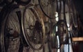 Detail of old bicycle wheel rim hanging in workshop Royalty Free Stock Photo